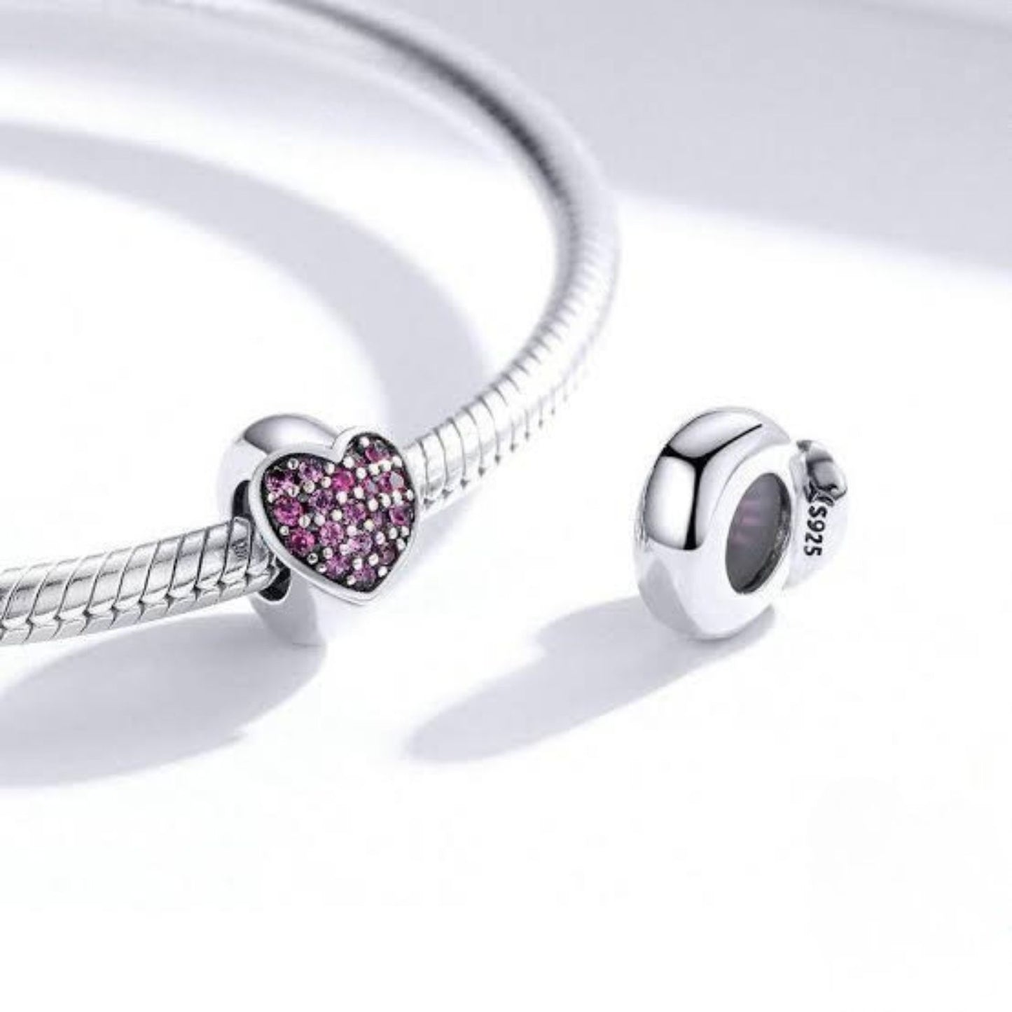 Charm Separador Corazón Gnoce en Plata 925 con Zirconias Rosadas