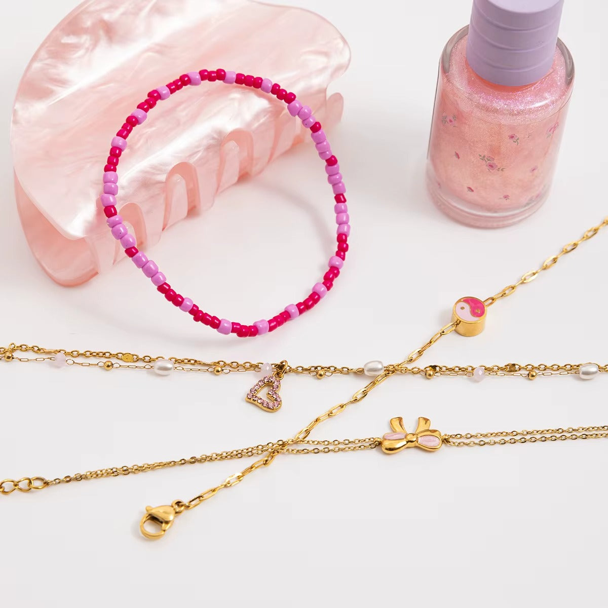 Pulsera Perlas y Corazón Rosa