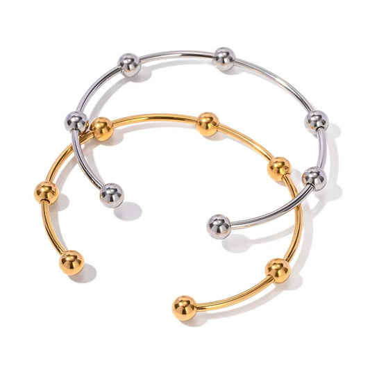 Pulsera Cuff con Esferas Doradas