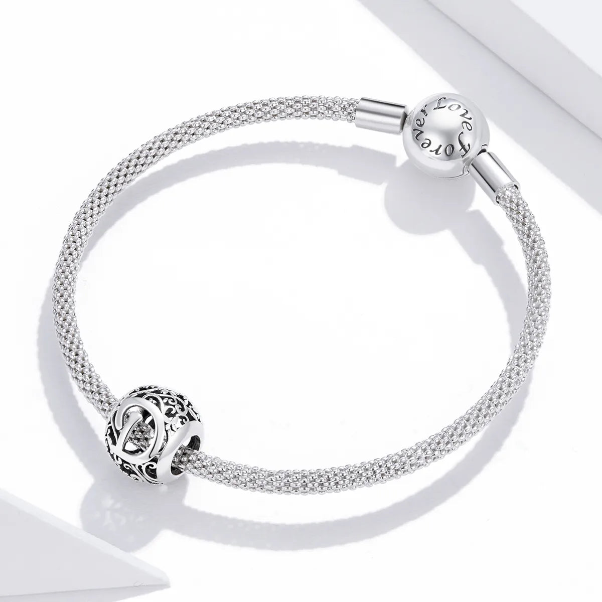 Charm de letra D de flor calada Gnoce