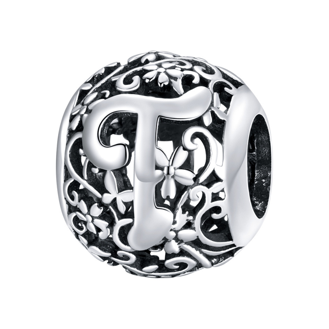 Charm de letra T de flor calada Gnoce