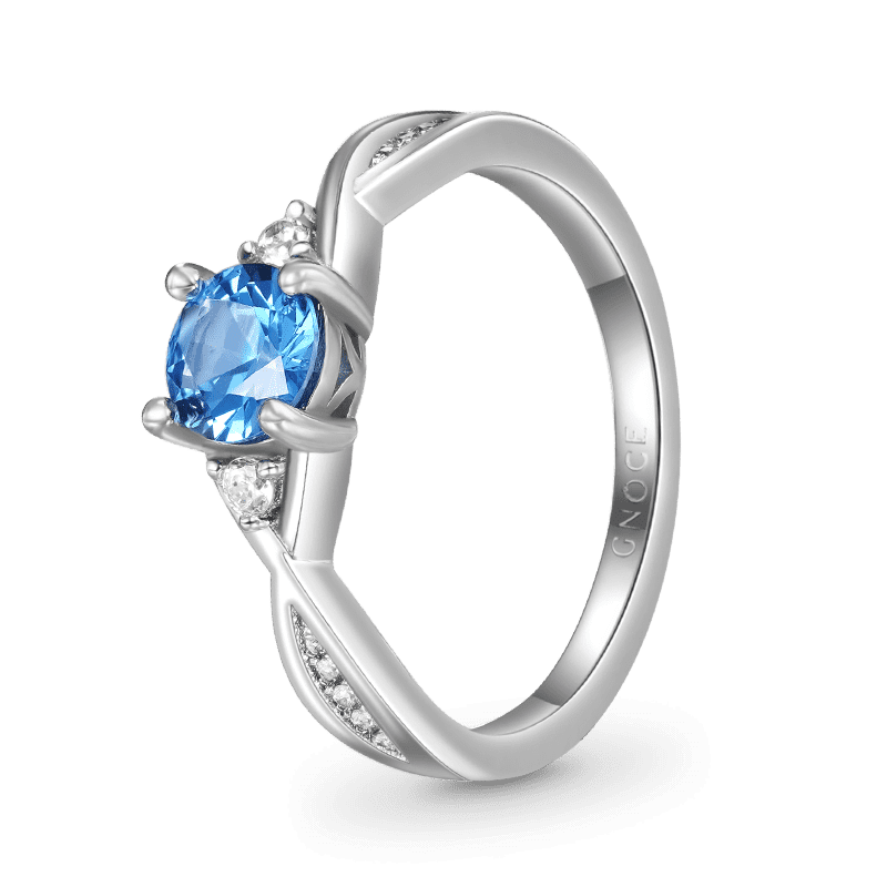Anillo Gnoce de promesa de corte redondo azul trenzado