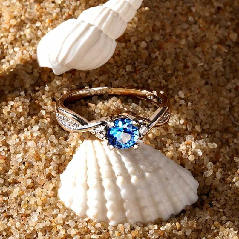 Anillo Gnoce de promesa de corte redondo azul trenzado