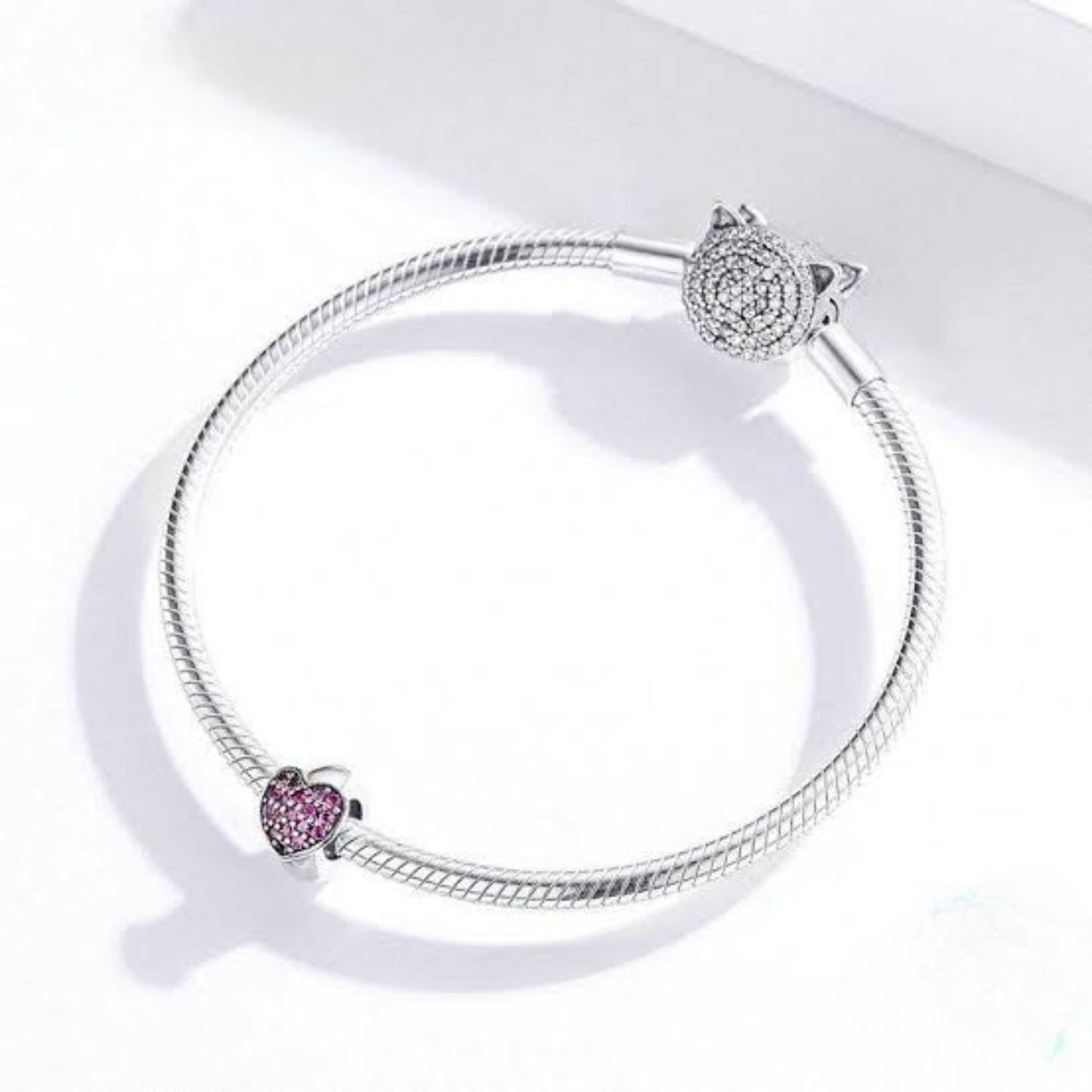Charm Separador Corazón Gnoce en Plata 925 con Zirconias Rosadas