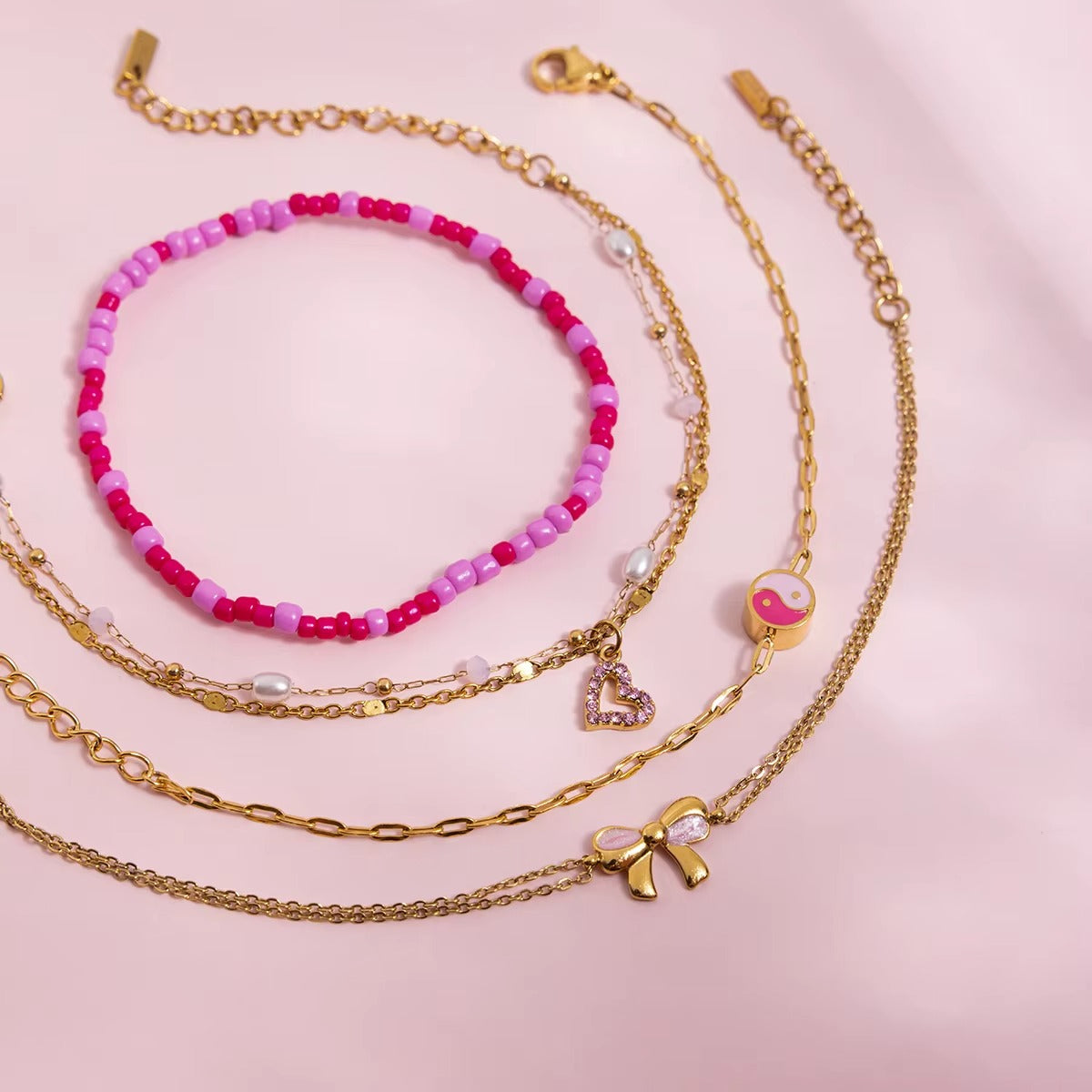 Pulsera Perlas y Corazón Rosa