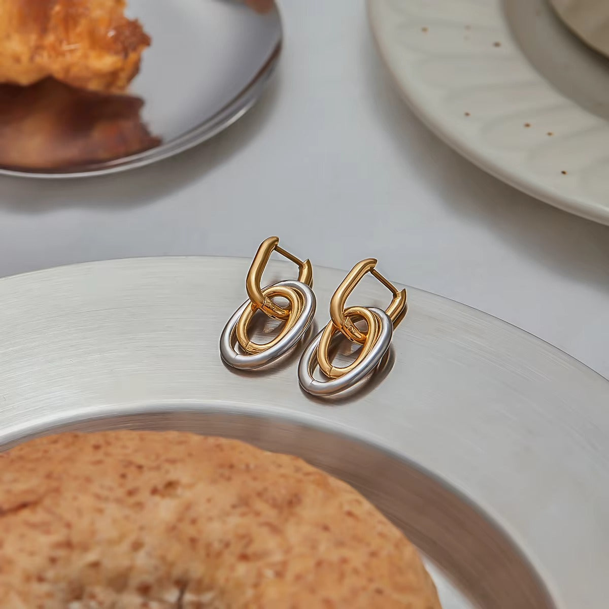 Aretes Entrelazados Dos Tonos